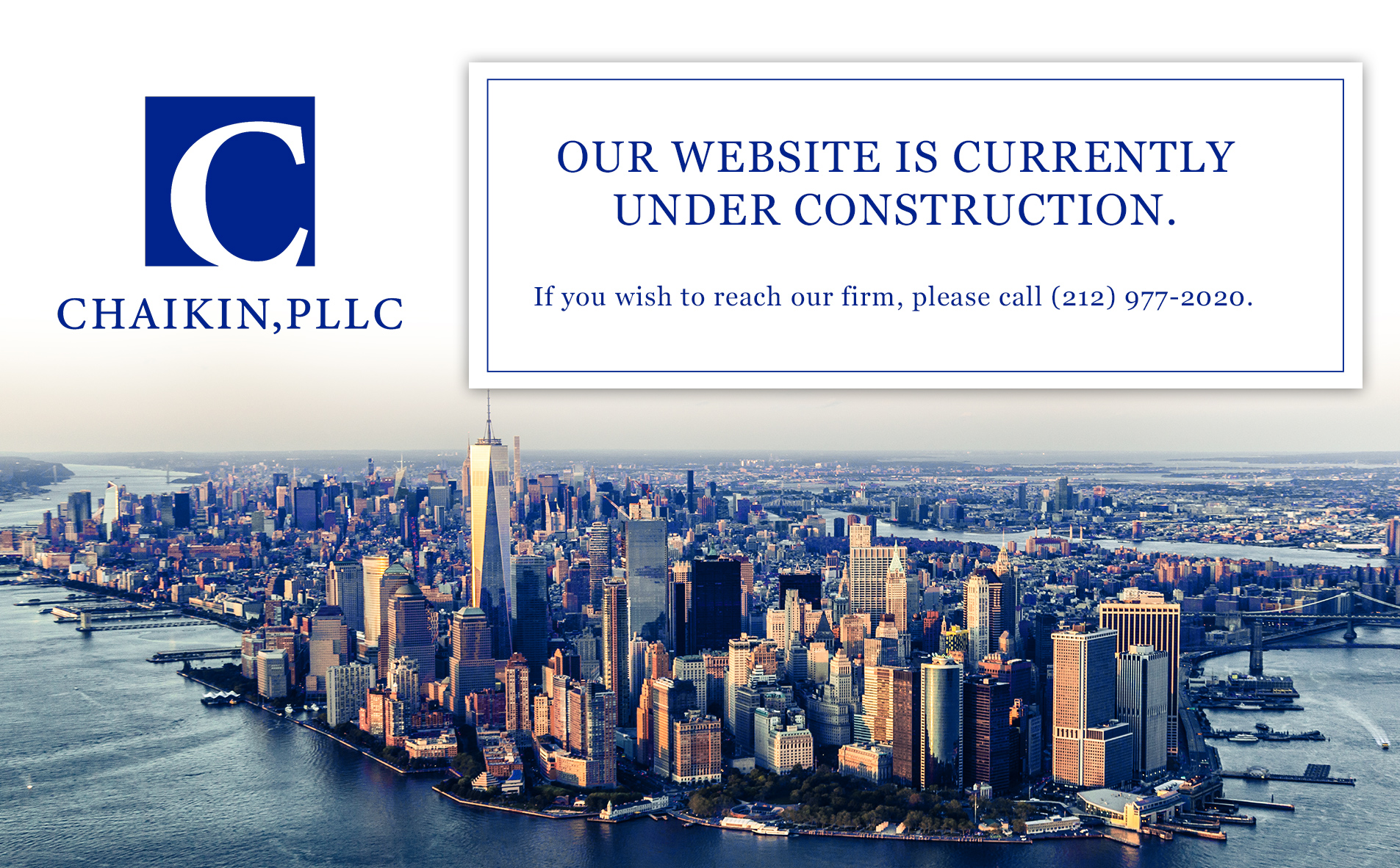 Chris standing up holding his daughter Elva